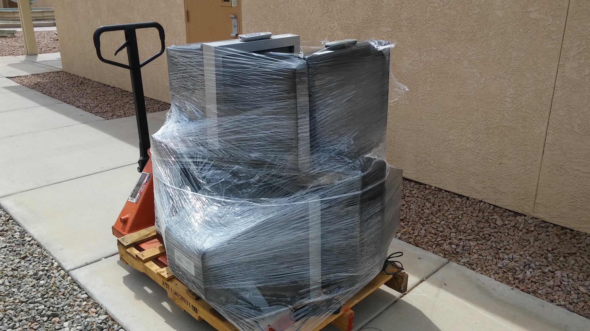 The Last shipment of TV's and DVD players donated to the Hotel San Carlos Apartments going to those in need.